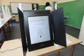 Machine for voting with sign Ã¢â¬ÅBulgarian elections for parliament, 2021Ã¢â¬Â and instructions for using the voting machine Royalty Free Stock Photo